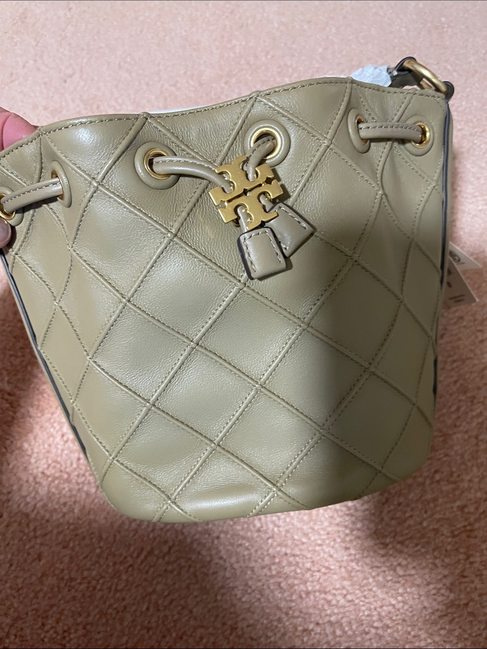 Tory Burch brand new draw string small bucket bag/comes with a dust bag